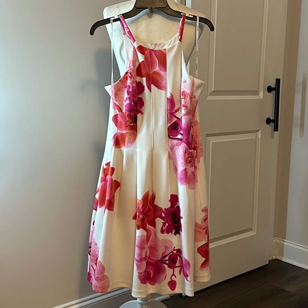 Calvin Klein Floral dress Pre-loved size 8 in excellent condition. No tags